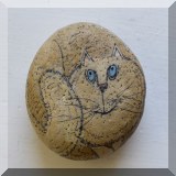 D101. Cat painted rock. 